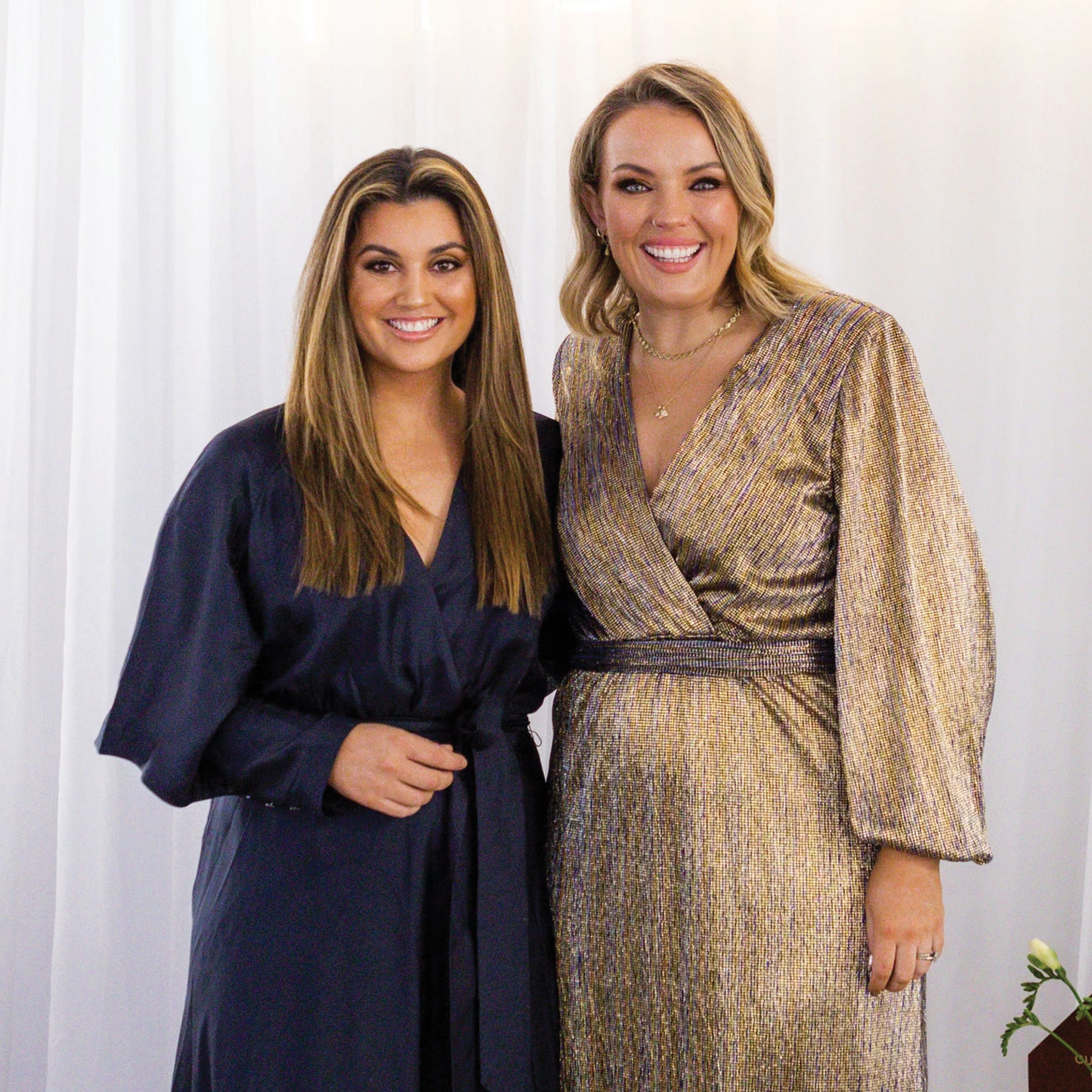 Jamila Rizvi, FW Managing Director and Hillary Holmes, makeup artist is pictured. They are standing together, smiling.